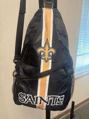 New Orleans Saints Black Sling Backpack with Gold Stripe